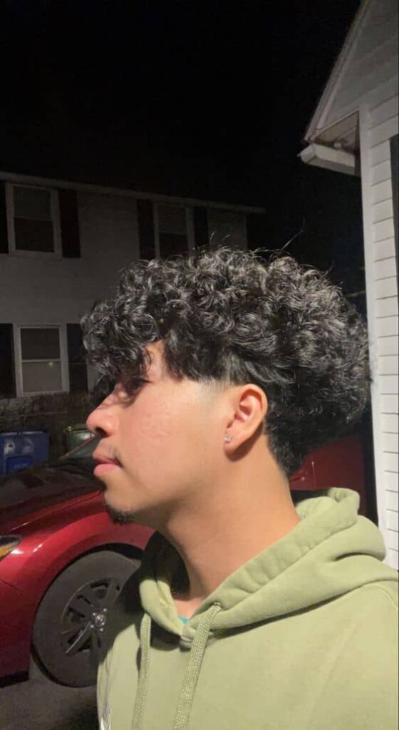 Mid Fade with Long Curly Top