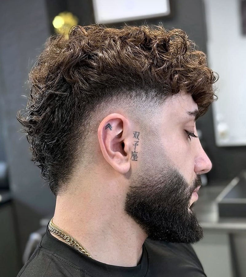 Low Fade with Side Part + Curls