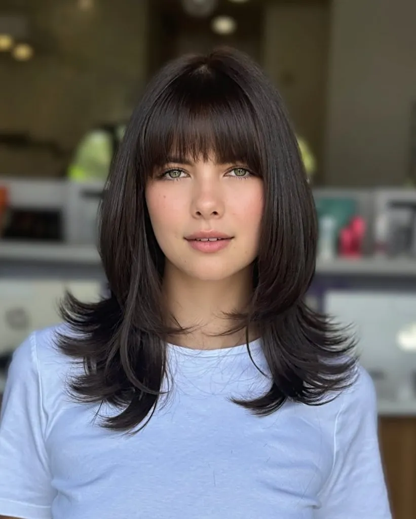 Modern Layers with Curtain Bangs