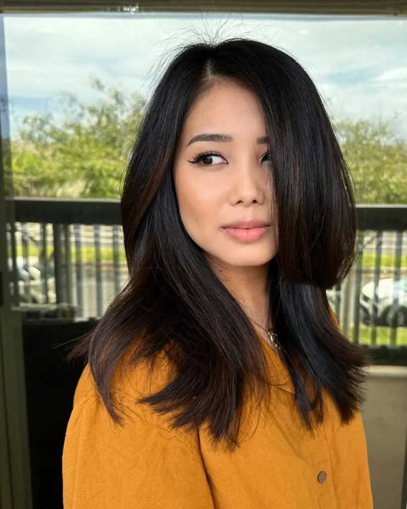 Voluminous Layers with a Side Part